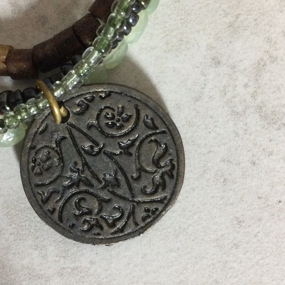 Aura four strand bead necklace with sun moon stars coin pendant - Picture 4 of 8